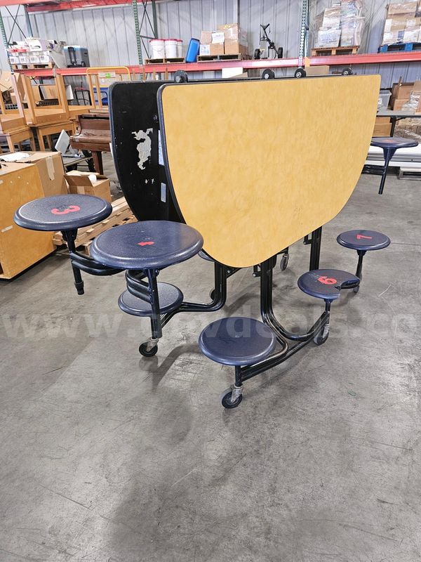 ONE FOLDING LUNCH ROOM TABLE (5FT X 6FT) (TABLE HAS ONE BROKEN SEAT)