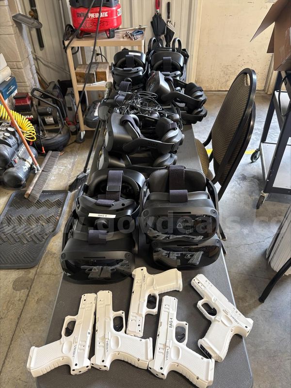 VIVE V.R. GOGGLES LAPTOPS AND CONTROLS FOR RANGE SIMULATION. (WORKING CONDITION IS UNKNOWN)