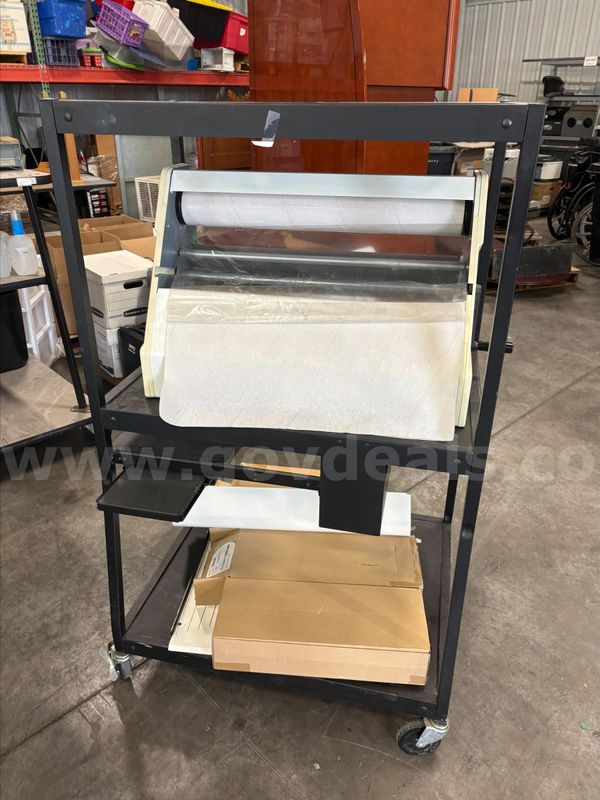ROLL LAMINATOR WITH EXTRA PRODUCT AND CART (WORKING CONDITION IS UNKNOWN)