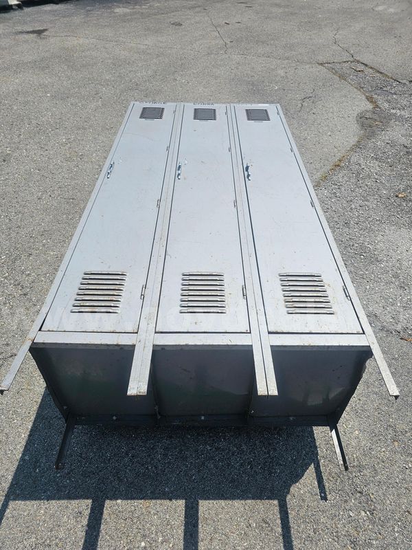 ONE SET OF METAL LOCKERS (3-DOOR) (78IN H X 36IN W X 18IN D)