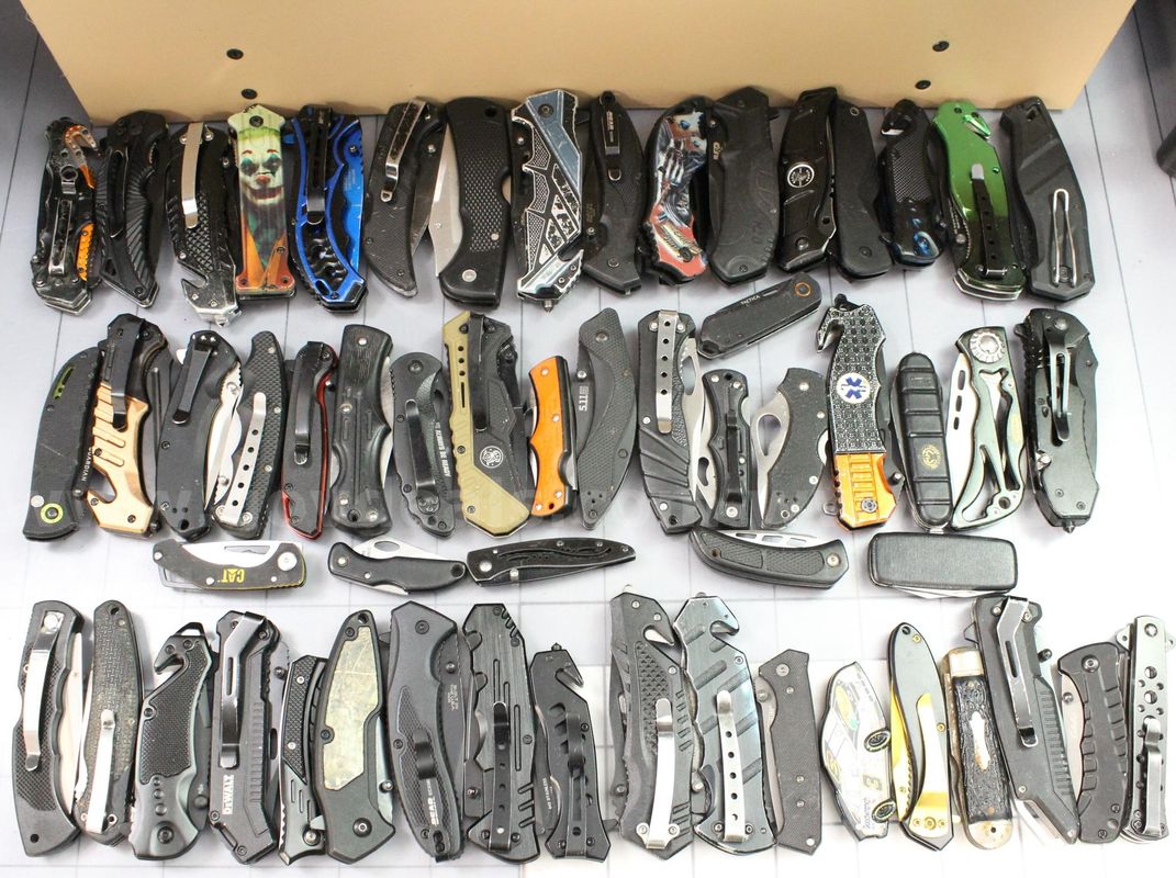 Approximately 12 lbs. of Assorted Black Knives, #36180