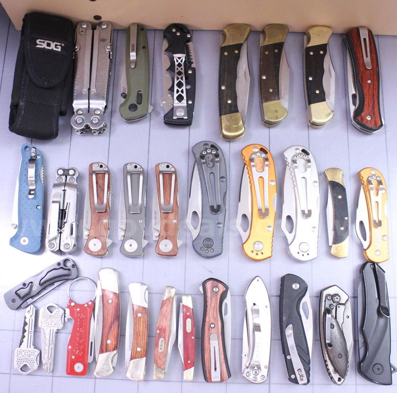 Approximately 6 lbs. of Assorted BUCK & SOG Knives, #35404