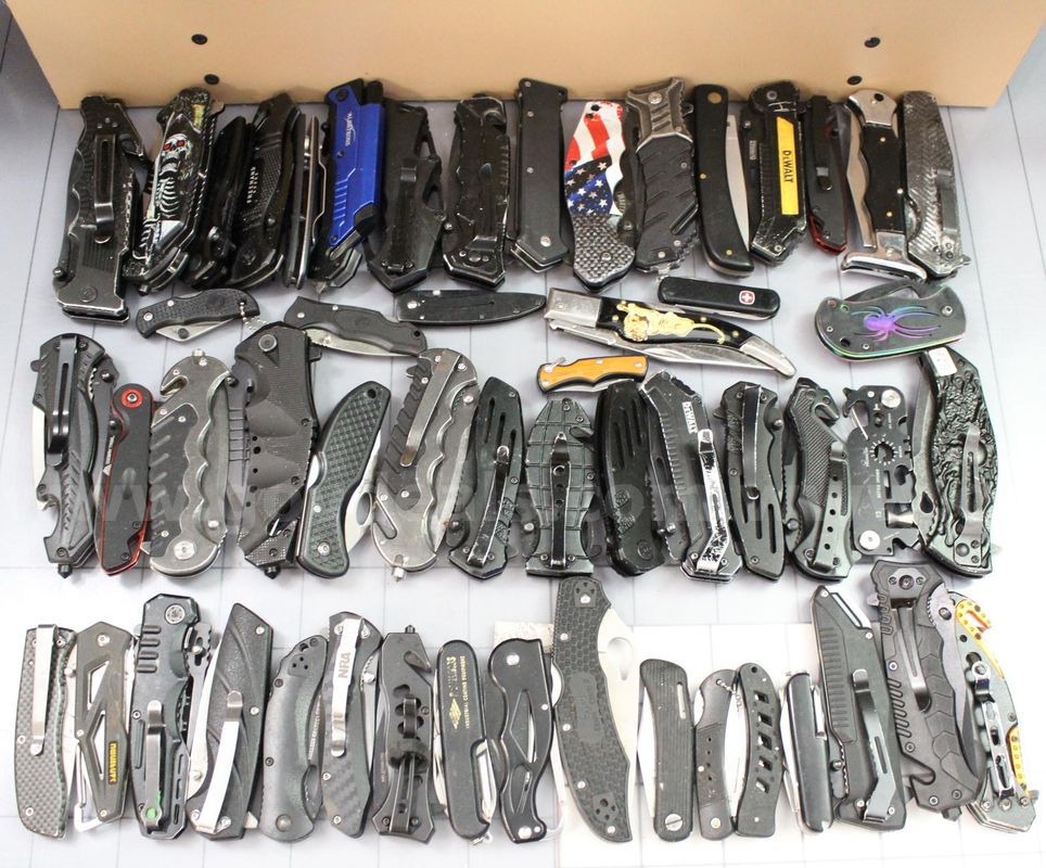 Approximately 12 lbs. of Assorted Black Knives, #35831
