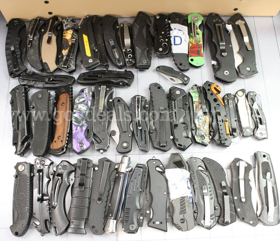 Approximately 12 lbs. of Assorted Black Knives/etc., #36487
