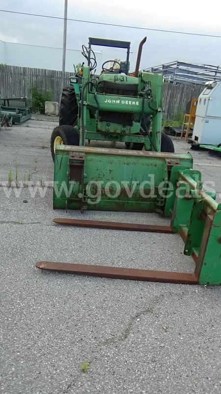 Used John Deere 640 Loader with bucket and fork