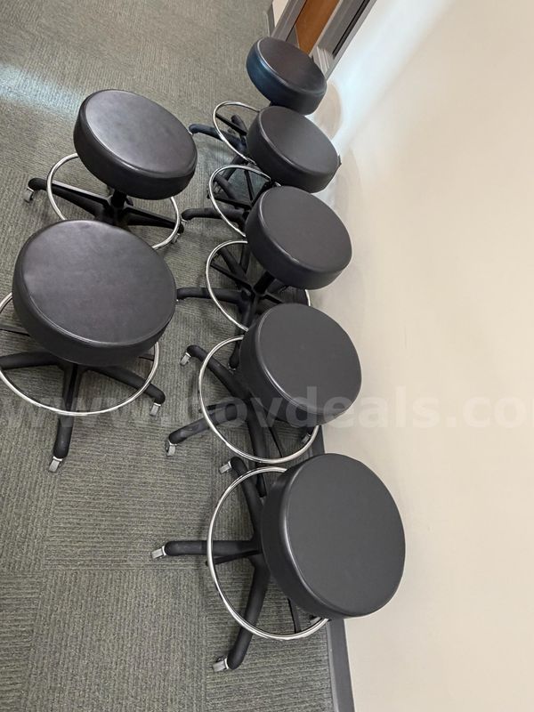 Lot of Seven (7) rolling and height adjustable stools