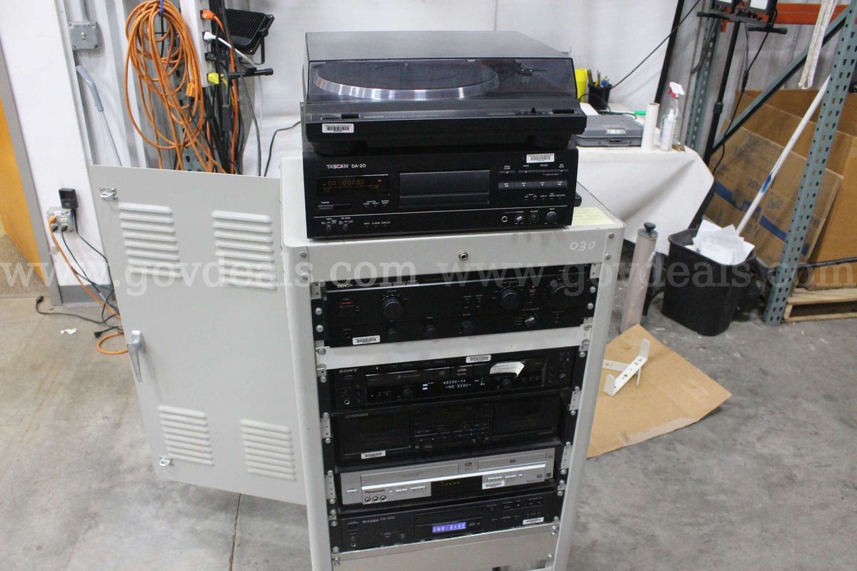Audio Cabinet with accompanying Equipment