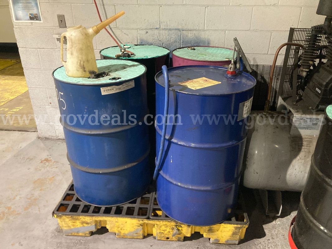 Lot of 9 55gallon Drums containing gear oil and brake flush