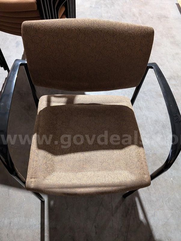 7 Used Stacking Chairs with Pattern