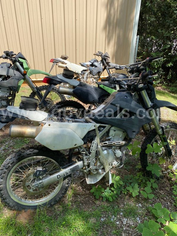 lot of 4 Kawasaki dirt bike motorcycles