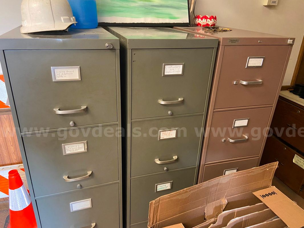 9 steel filing cabinets