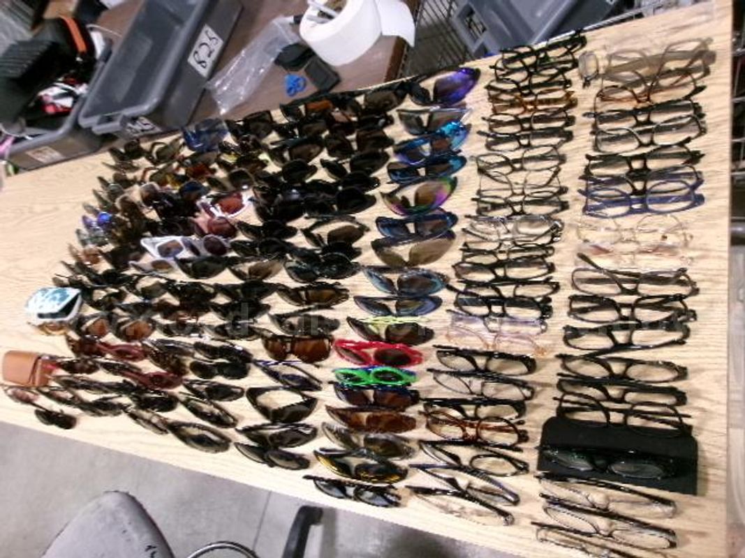 Lot of 107 Sunglasses and 46 Eyeglasses.