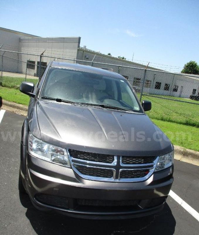 2015 Dodge Journey; 155,472 Miles.