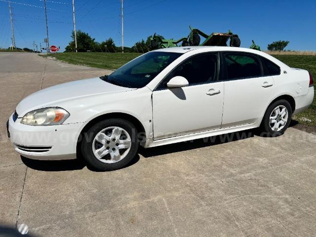 2009 Chevrolet Impala; 265,201 Miles.