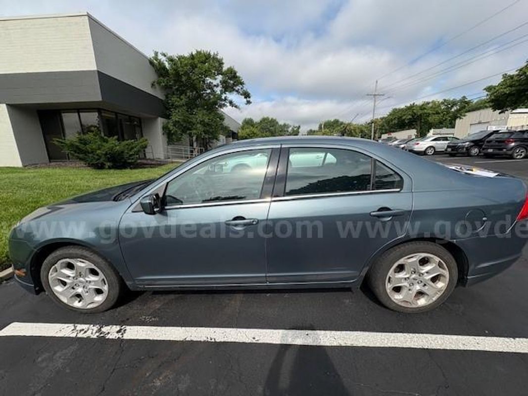 2011 Ford Fusion; 157,297 Miles.