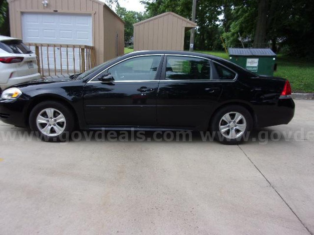 2013 Chevrolet Impala; 188,541 Miles.