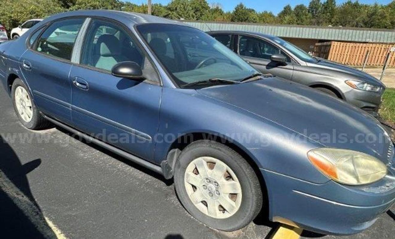 2001 Ford Taurus LX; 235,294 Miles.