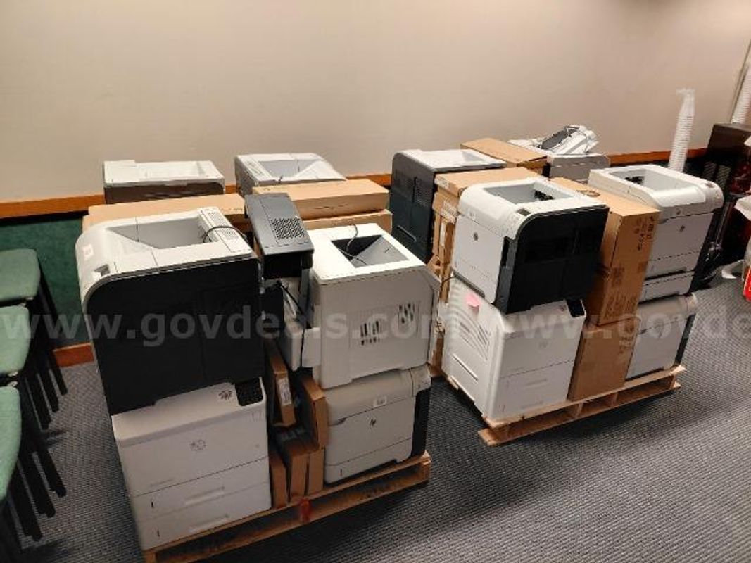 Lot of (24) HP Printers, (8) Mitel Phones, (2) Servers and More.