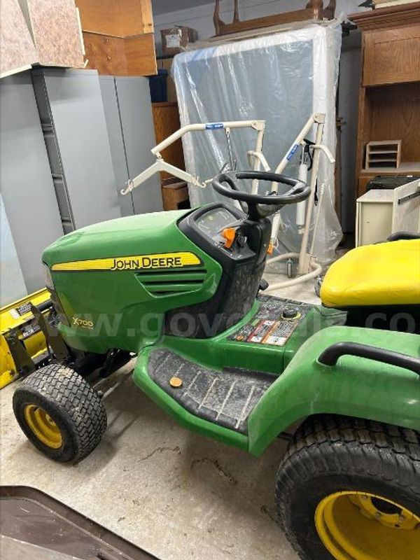 Lot of (1) John Deere X700 Riding Mower with Blade.