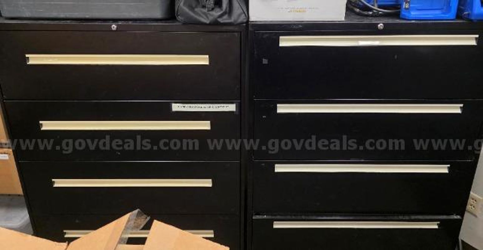 Lot of (7) Metal Lateral File Cabinets and (6) Metal Bookshelves.