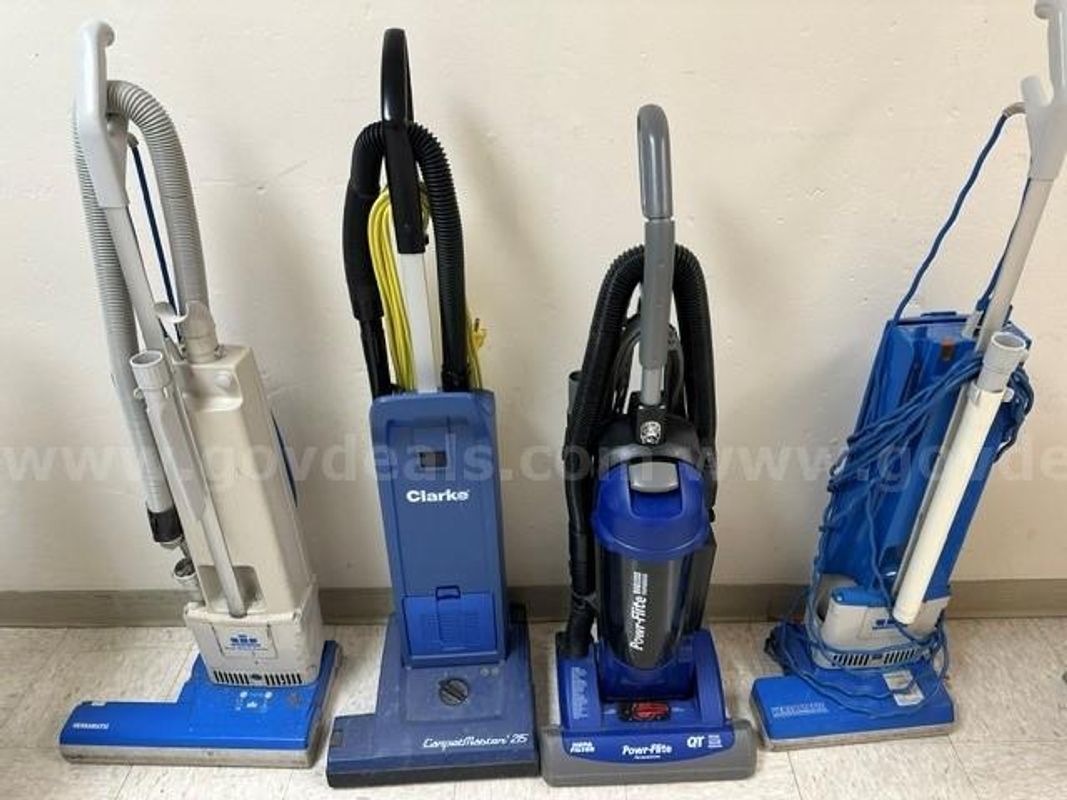 Lot of Upright Vacuum Cleaners.
