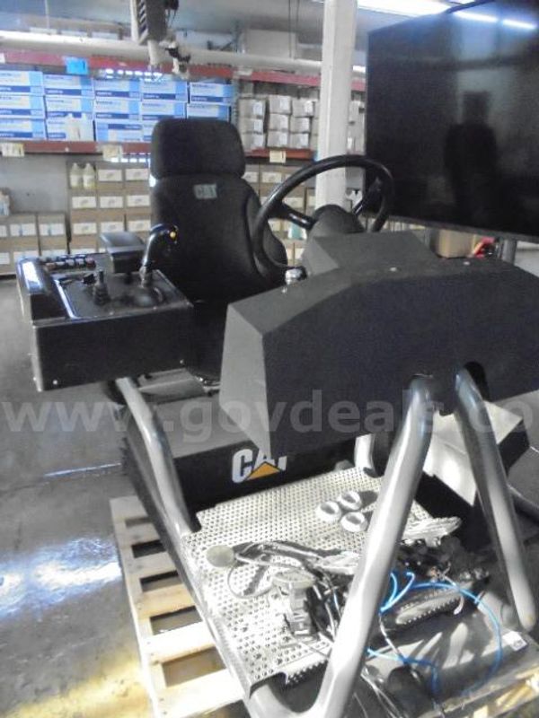 Lot of (1) Cat Small Wheel Loader Simulator.