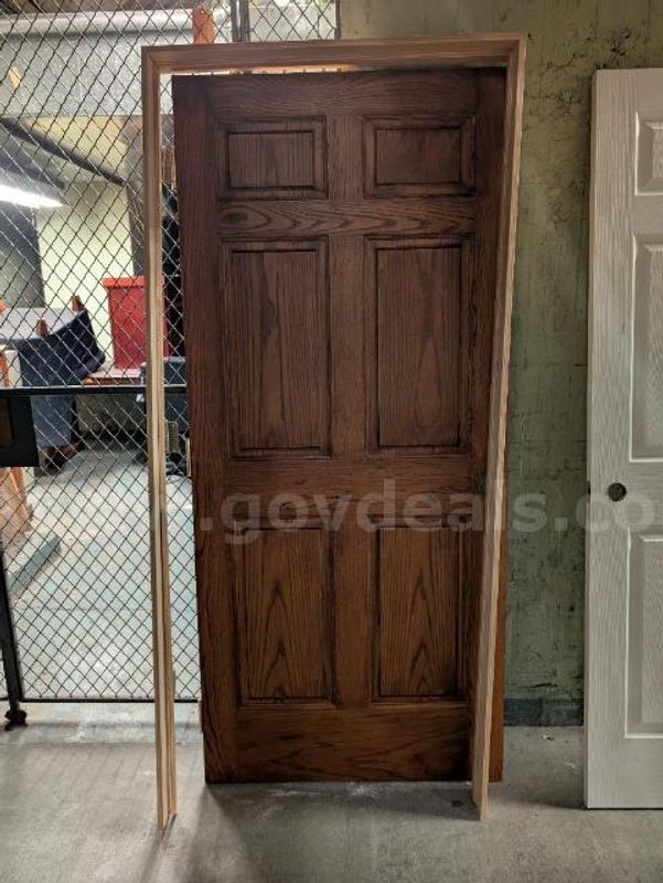 Lot of (1) Hollow Core 6 Panel Door and (1) Solid Core 6 Panel Door.