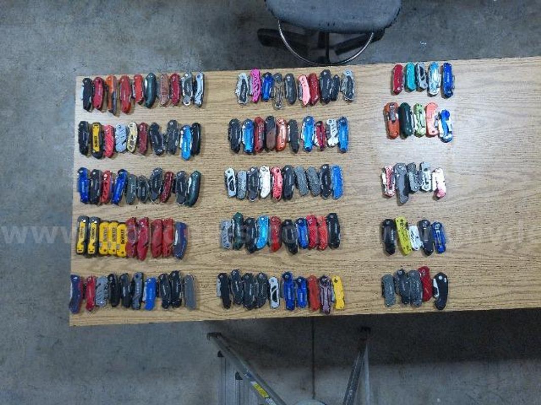 Approximately 125 box knives