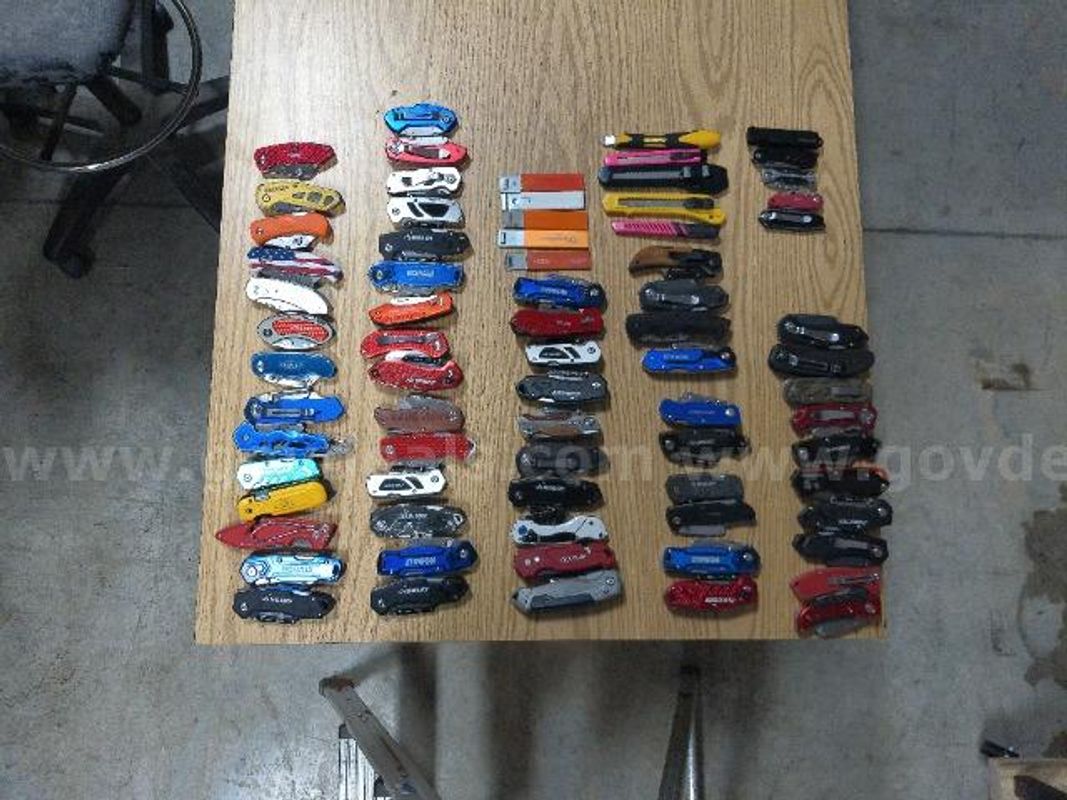 ~ 60 folding razor Knives in various condition.