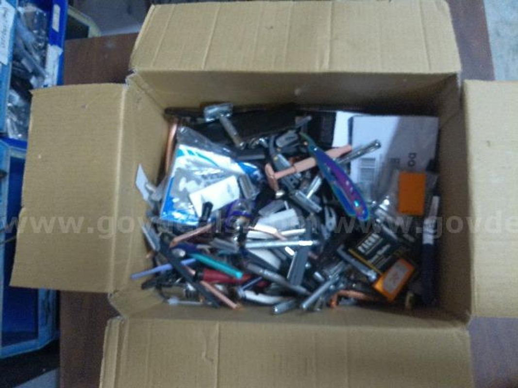 Box of razors, razor blades and straight razors.