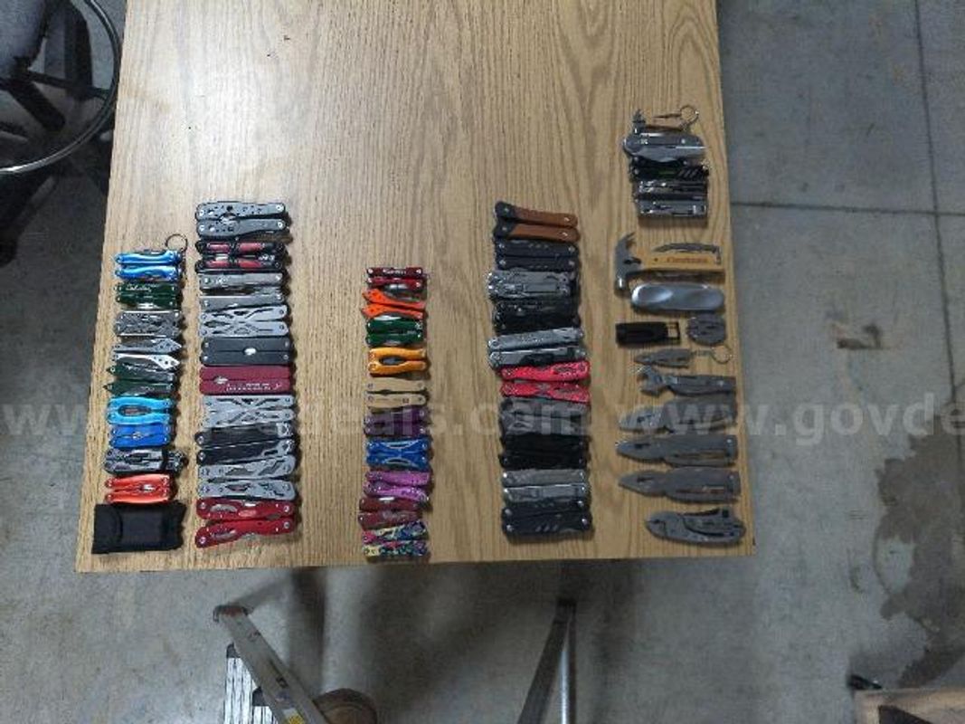 Lot of approximately 55 multi-tools in various condition.