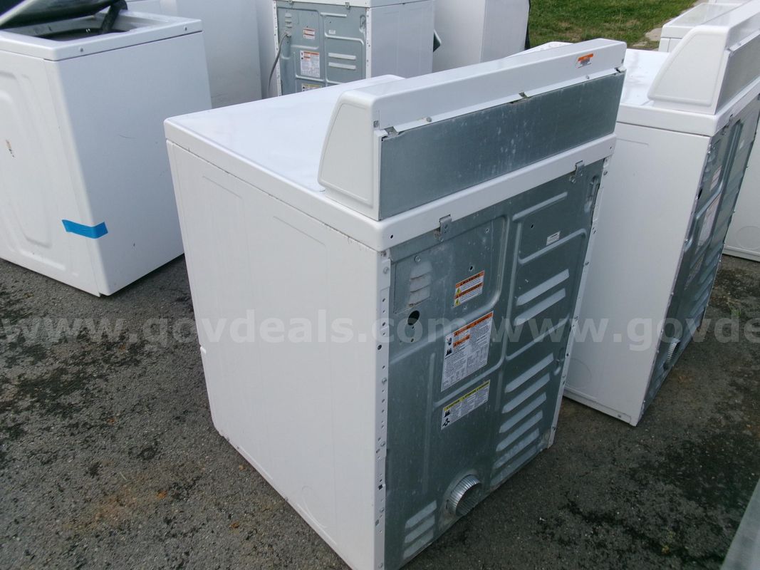 1 Speed Queen Washer and 4 Dryers