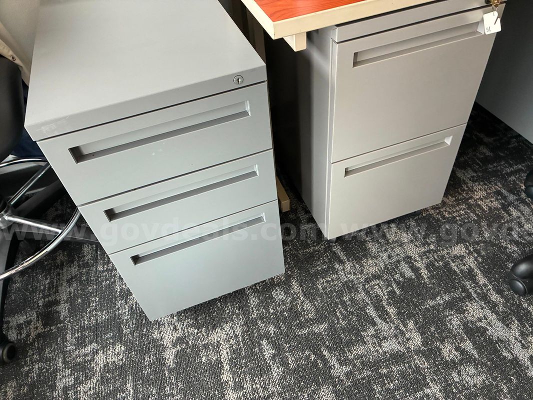 4- 2 Drawer File Cabinets and 3- 3 Drawer File Cabinets Gray on Wheels