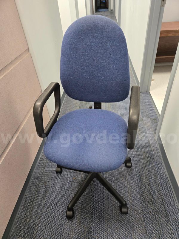 8 Chairs: 4 Blue Chairs with Handles, 2 Blue Chairs without handles, 1 Purple Chair, 1 Tall Back Office Chair