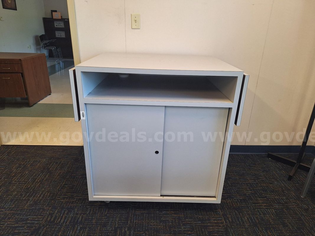 1 Desk, 1 Desk Return, 2 Carts, and 1 Cabinet