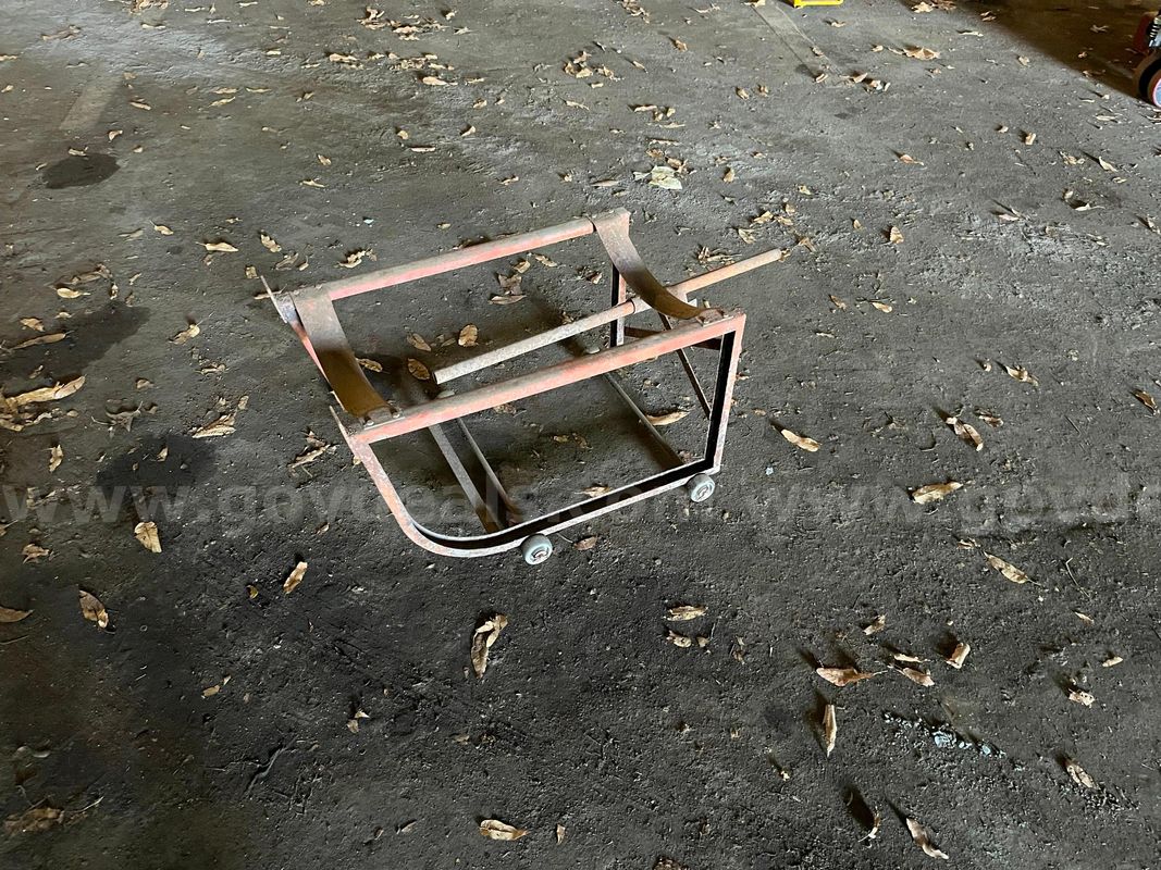 (1) Metal drum storage rack (single drum) & (1) Metal multiple drum storage rack