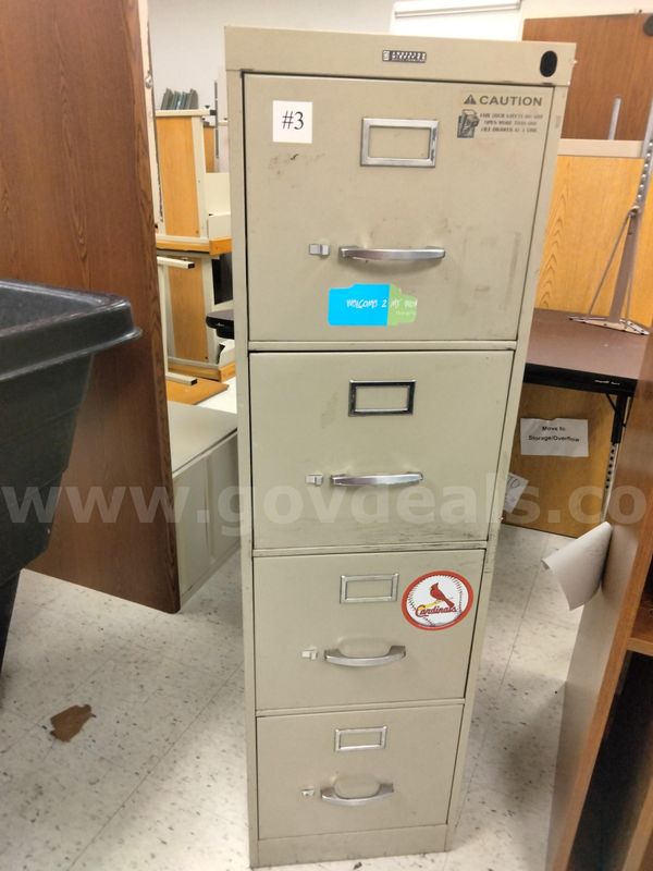 Chairs, file cabinets, computer desk
