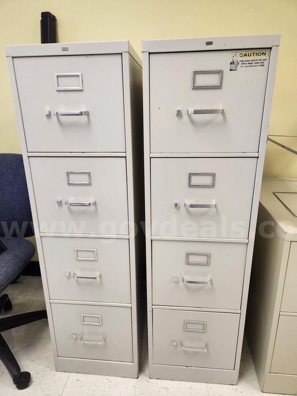 File cabinets, chairs, AV cart, table, and more