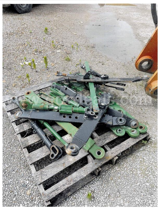 John Deere and New Holland lift Arms