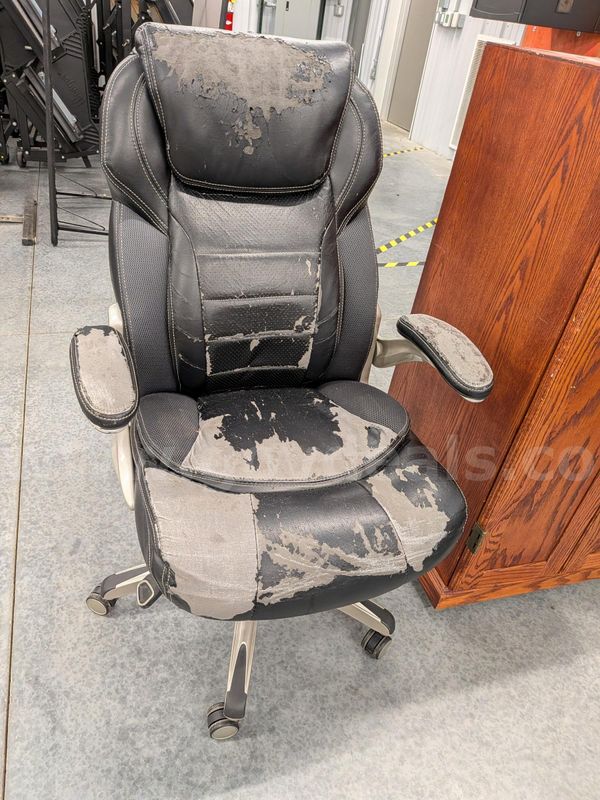 Faded "leather" office rolling chair
