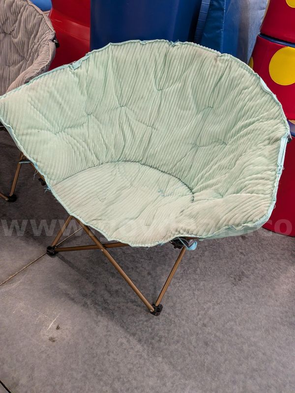 Faded light green collapsible chair