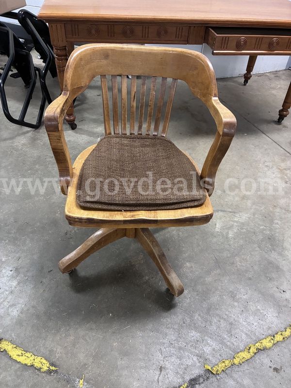 Wood (solid) chair, on wheels