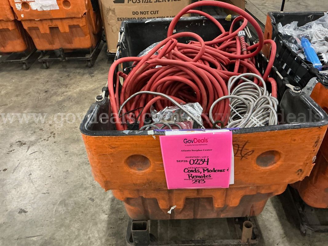 Salvaged: "Modems, Remotes, Cords and Accessories" (SEP26-0234)