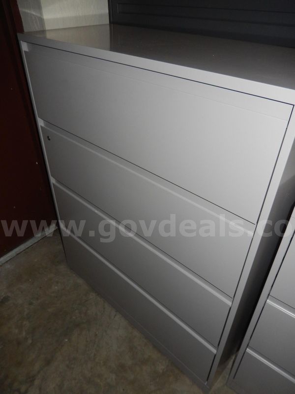 USED (1) BEIGE METAL, 4-DRAWER LATERAL 18"D X 42"W X 52"H