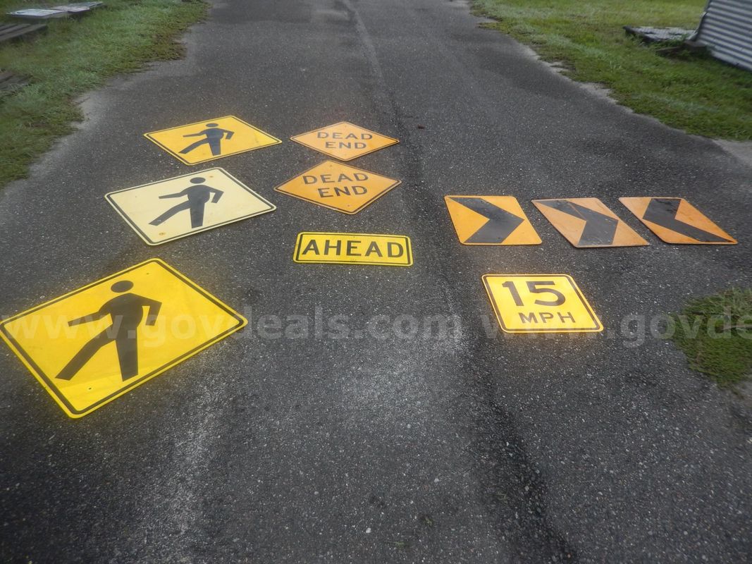 USED (3) PEDESTRIAN CROSSING SIGNS, (2) DEAD END SIGNS, (3) ROAD SIGNS, (1) AHEAD SIGN, (1) 15 MPH SIGN