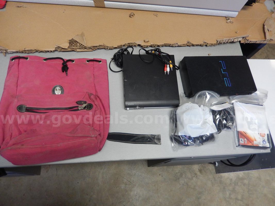 USED (1) PINK/BLACK BACKPACK, (1) SONY, PLAYSTATION 2, SCPH-50001 WITH 2 CONTROLLERS, (1) CURTIS DVD PLAYER,