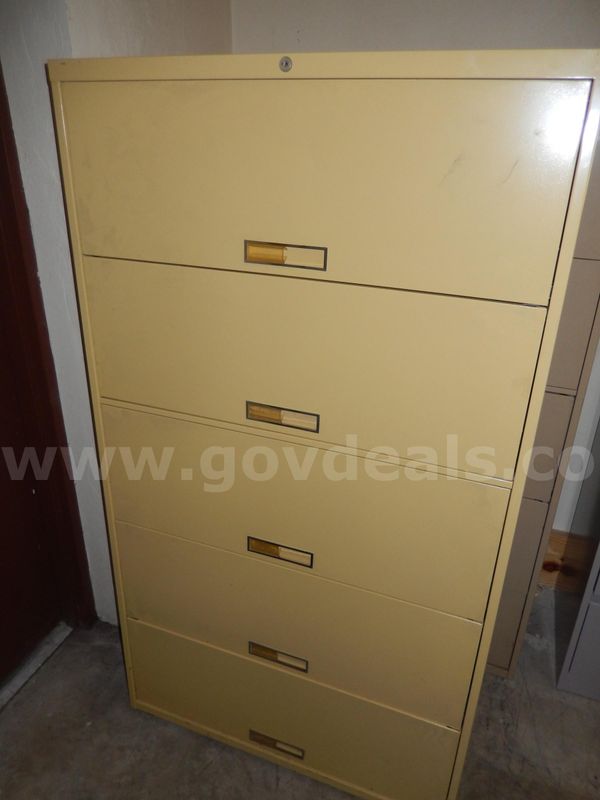 USED (1) YELLOWISH TAN, 5-LATCH DOOR, LATERAL 65" H x 18" W x 36" L