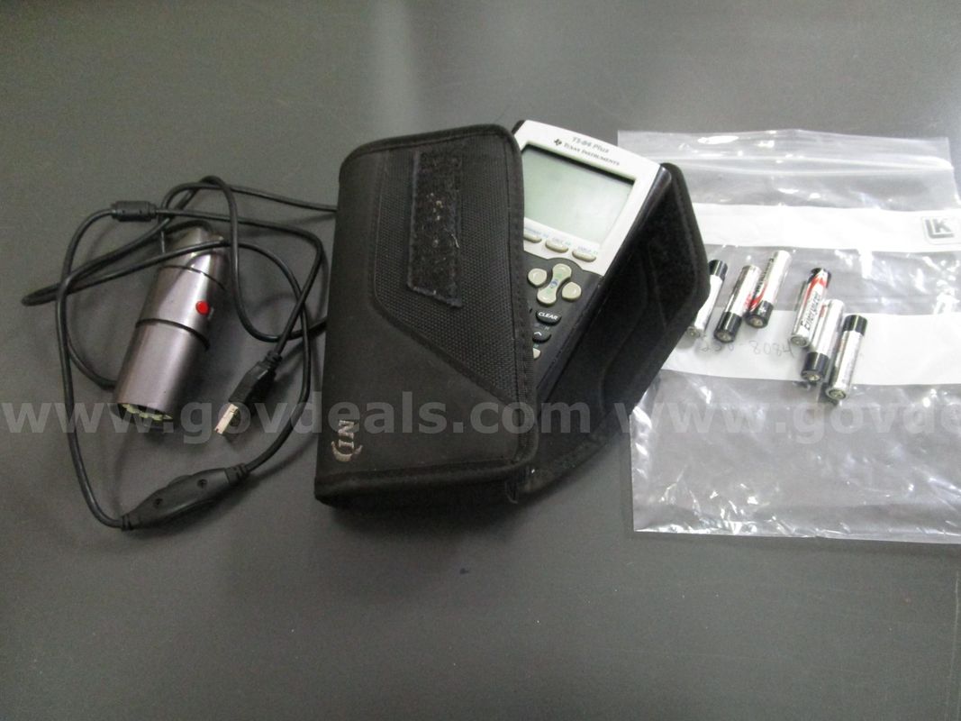 (1) Used Scientific Calculator; (6) Working Batteries; (1) Used Usb Microscope