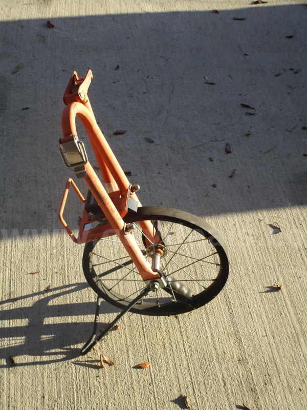 (1) Used Orange Rolling Meter Wheel