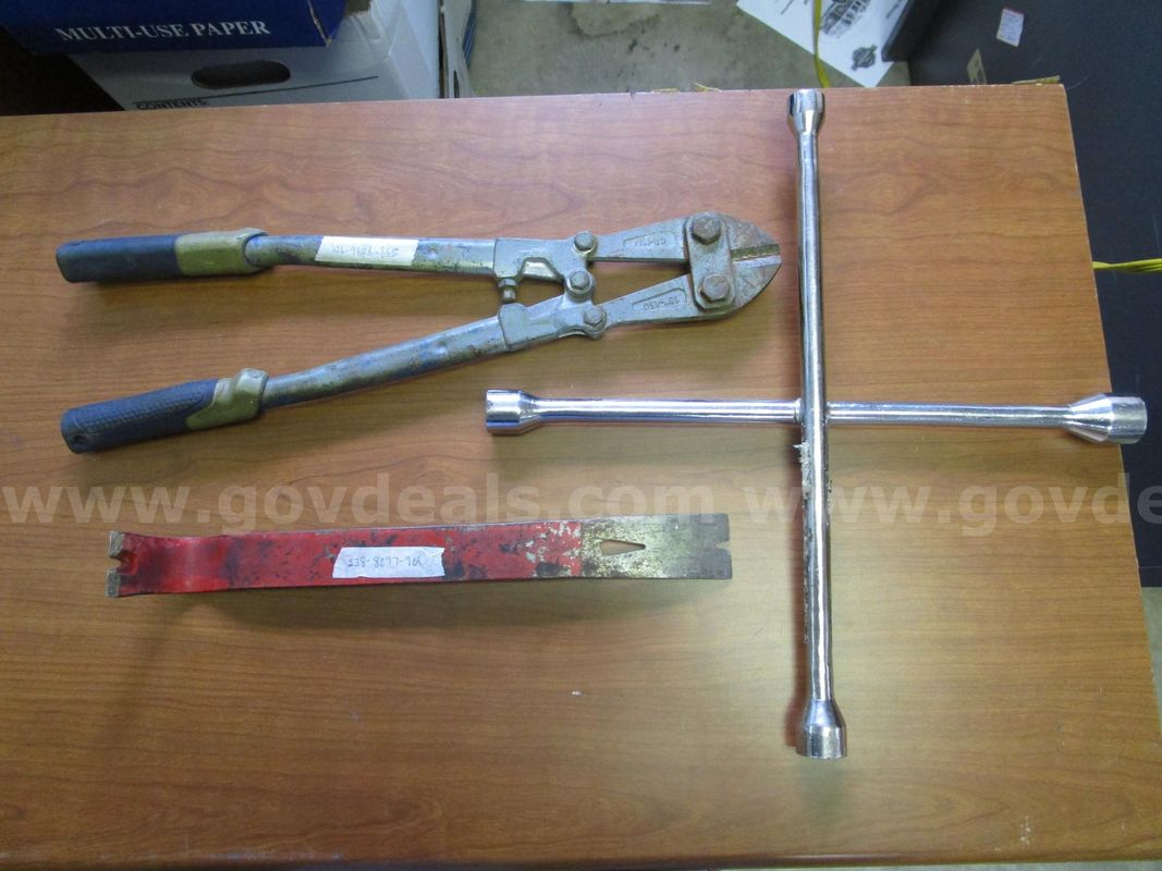 (1) USED BOLTCUTTER; (1) USED PRYBAR; (1) USED CROSS LUG WRENCH